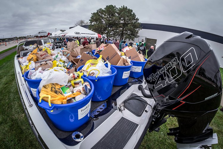 Mercury Marine raises nearly $11,000 during its annual Fill the Boat to Cast Out Hunger food drive